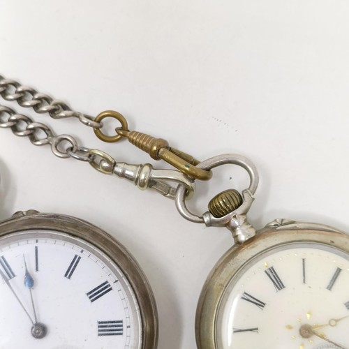 655 - A silver open face pocket watch, with a chain, and another silver open face pocket watch (2)