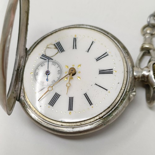 655 - A silver open face pocket watch, with a chain, and another silver open face pocket watch (2)