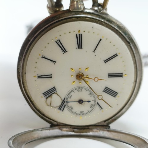 655 - A silver open face pocket watch, with a chain, and another silver open face pocket watch (2)