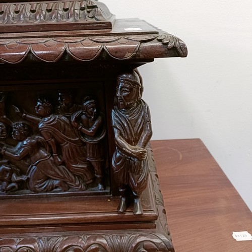 1327 - An unusual carved mahogany Grand Tour type casket, with a lift off lid, with monopodia corner suppor... 