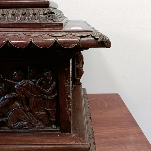 1327 - An unusual carved mahogany Grand Tour type casket, with a lift off lid, with monopodia corner suppor... 