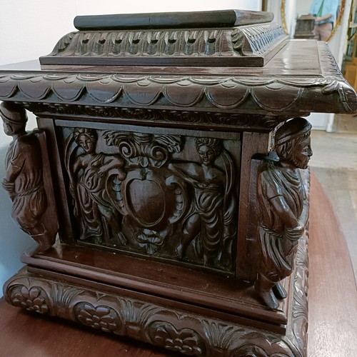 1327 - An unusual carved mahogany Grand Tour type casket, with a lift off lid, with monopodia corner suppor... 