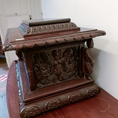 1327 - An unusual carved mahogany Grand Tour type casket, with a lift off lid, with monopodia corner suppor... 