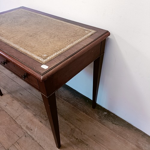 1328 - A late 19th century mahogany writing table, with gilt metal mounts, having two frieze drawers, 89 cm... 