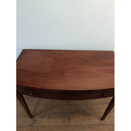 1304 - A mahogany bow front side table, with a single drawer, 103 cm wide