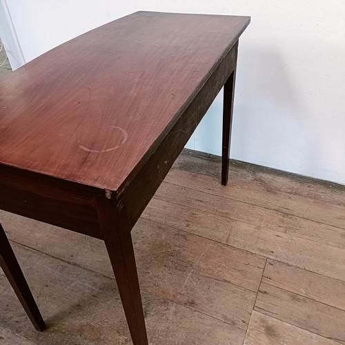 1304 - A mahogany bow front side table, with a single drawer, 103 cm wide