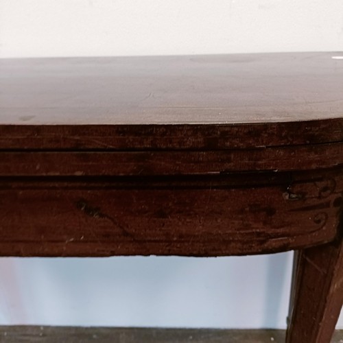 1308 - A mahogany folding card table, 95 cm wide