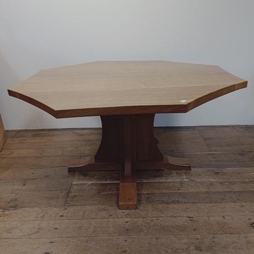 1333 - A Robert 'Mouseman' Thompson of Kilburn adzed oak octagonal dining table, 140 cm wide