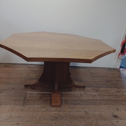 1333 - A Robert 'Mouseman' Thompson of Kilburn adzed oak octagonal dining table, 140 cm wide