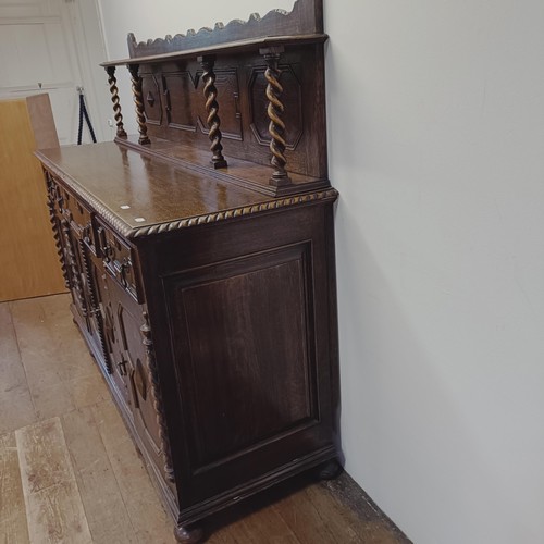 1370 - A 1920s oak sideboard, 184 cm wide