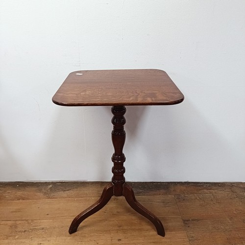 1317 - A nest of three mahogany tables, inset with leather tops, 53 cm wide, a rectangular wine table, 45 c... 