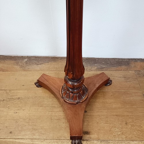 1315 - A 19th century rosewood duet stand, with two pierced adjustable music holders, on a carved column su... 