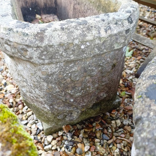 1444 - A composite stone rectangular planter, with carved lion decoration, on composite stone stands...