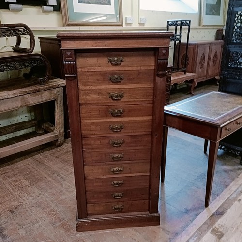 1326 - A late 19th century Wellington mahogany chest, having eleven drawers, 130 cm high x 80 cm wide