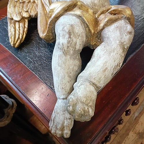 1324 - A large pair of carved and painted cherubs, 76 cm high x 46 cm wide (2)