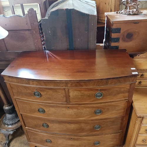 1355 - A 19th century mahogany bow front chest, having two short and three long drawers, 107 cm wide