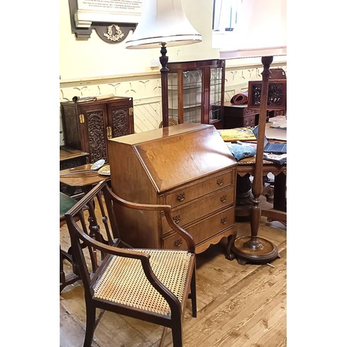 1318 - A mahogany bureau, 76 cm wide, an armchair and a standard lamp (3)