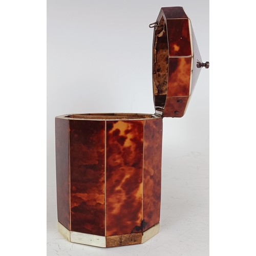 1175 - A George III decagon tea caddy, veneered in tortoiseshell and ivory banding, the front with a silver... 