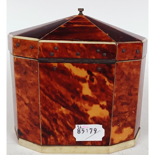 1175 - A George III decagon tea caddy, veneered in tortoiseshell and ivory banding, the front with a silver... 