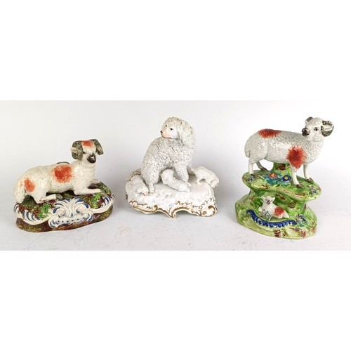 1167 - An early 19th century Staffordshire Walton hollow base group, of a sheep and a lamb, 13.5 cm high, a... 