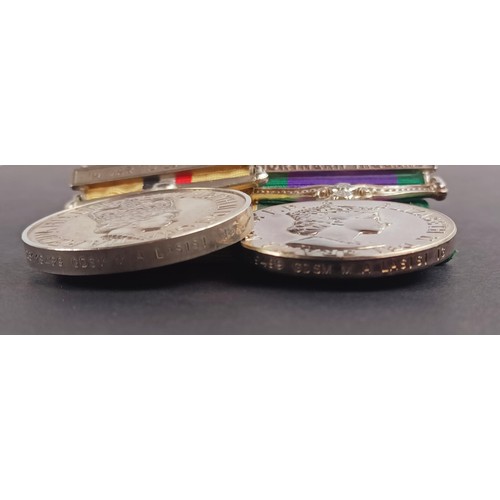 50 - A pair of medals, awarded to 25119499 Gdsn M A Lasisi IG, comprising an Iraq medal, with 18 Mar to 2... 