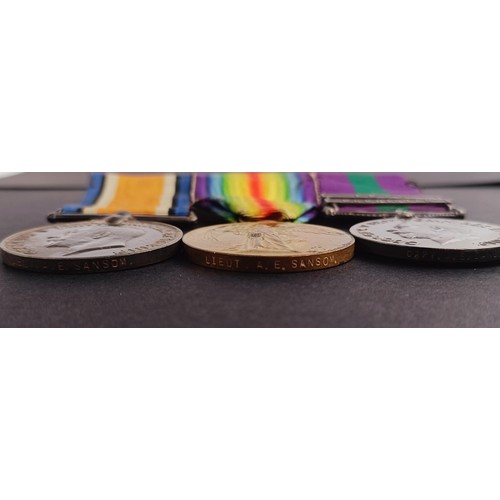 57 - A group of three medals, awarded to Captain A E Sanson, comprising a British War medal, Victory meda...