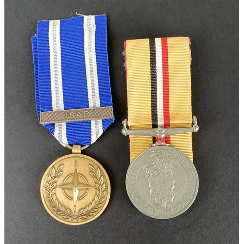 60 - A pair of medals, awarded to 25180682 Gdsn J S Price Grenadier Guards, comprising an Iraq medal and ... 