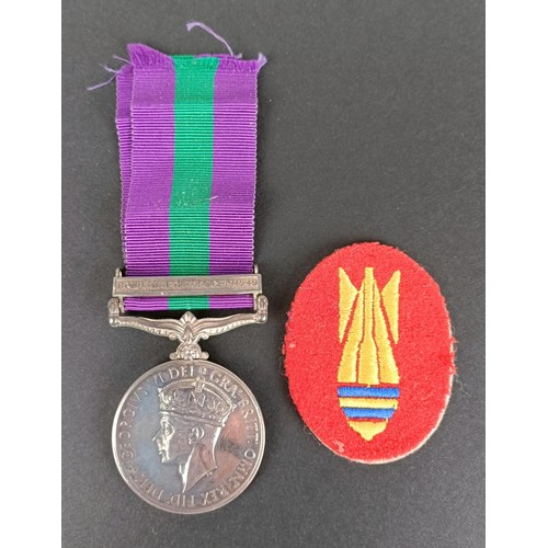 79 - A General Service medal 1918-62, awarded to 11565031 Dvr J Mortimer RE, with Bomb & Mine Clearan... 