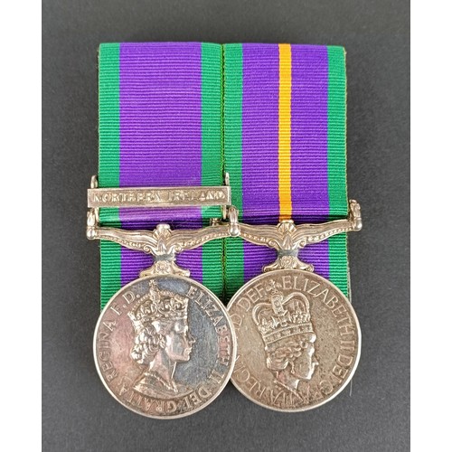 88 - A pair of medals, awarded to 24855565 Pte L W J Chambers, Royal Irish (HS), comprising a General Ser... 