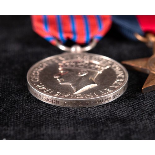 108 - A group of five medals, awarded to Captain John Nightingale RA, comprising a George Medal, 1939-1945... 