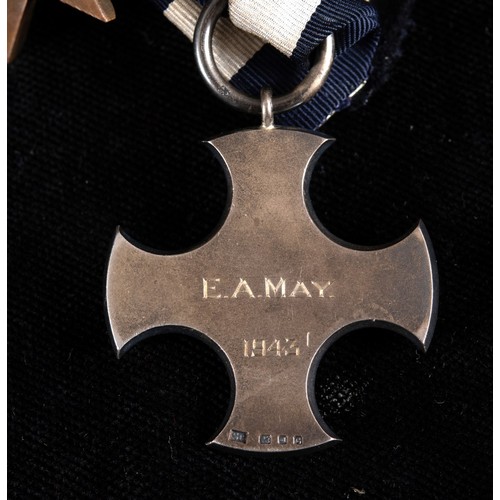 116 - The group of seven medals, awarded to E A May (HMS Abdiel), comprising a Distinguished Service Cross... 