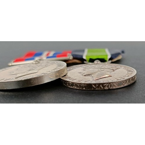 149 - A pair of medals, awarded to Sergeant Mazon Masiwa, comprising a War medal, and a Colonial Police Lo... 