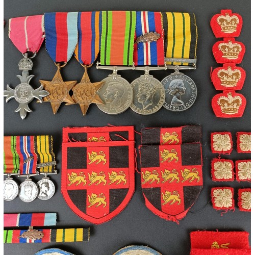 219 - A group of six medals, awarded to Colonel R C Thompson, Staff, comprising an OBE, a 1939-1945 Star, ... 