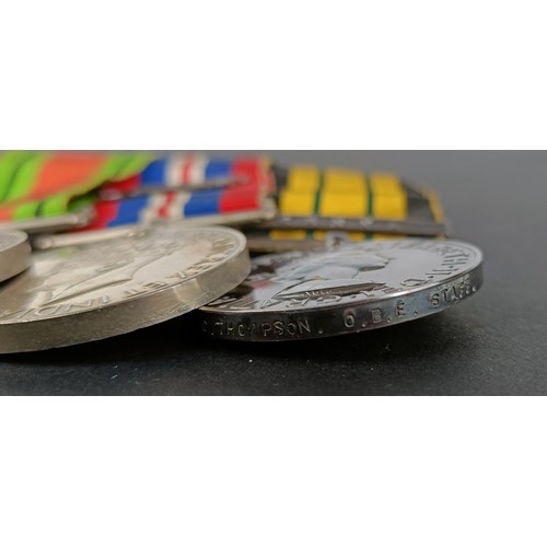 219 - A group of six medals, awarded to Colonel R C Thompson, Staff, comprising an OBE, a 1939-1945 Star, ... 