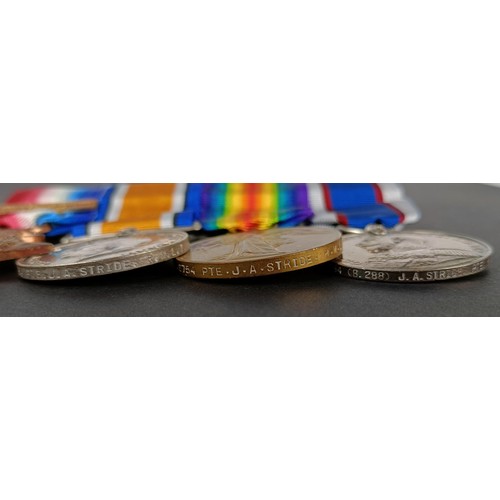 228 - A group of four medals, awarded to CH 6754 Pte J A Stride RM Brigade, comprising a 1914-15 Star trio... 