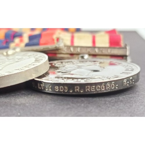 232 - A group of six medals, awarded to S Lt (SD) R Record RN, comprising a 1939-1945 Star, an Atlantic St... 