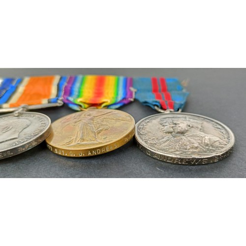 238 - A group of four medals, awarded to 12477 Cpl G Andrews R Fus, comprising a 1914-15 Star trio, and a ... 