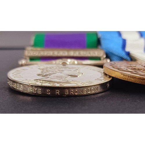 258 - A group of five medals, awarded to 24554986 L Cpl S R Bronsdon Royal Anglian, comprising a Campaign ... 