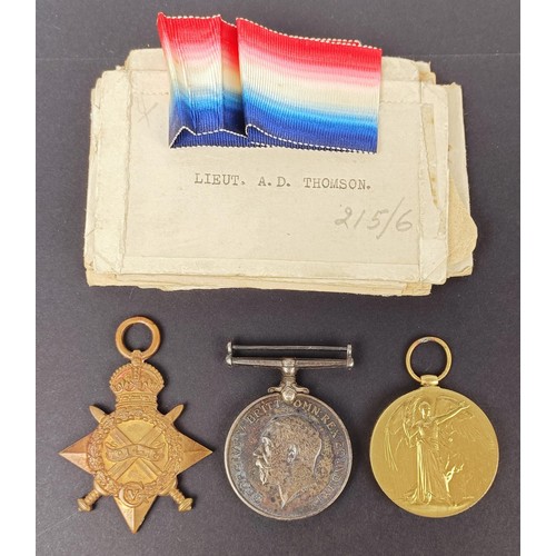 276 - A 1914-15 Star trio, awarded to Lieut A D Thomson Manchester Regiment, with boxes of issue, with cop... 