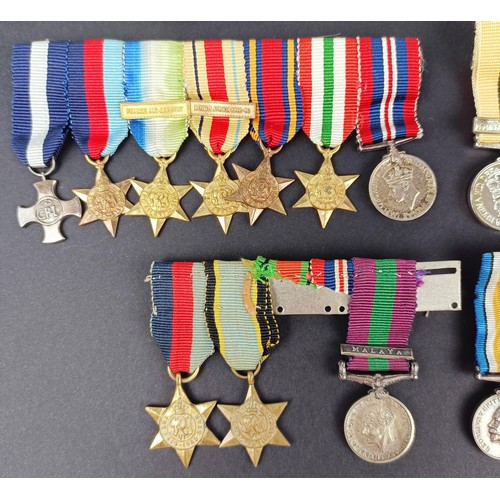 277 - A group of seven miniature medals, including a Distinguished Service Cross (DSC), and other assorted... 