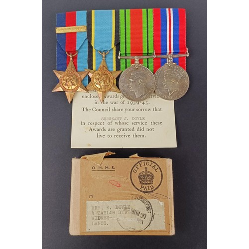 280 - A group of four medals, awarded to Sergeant J Doyle, comprising a 1939-1945 Star with Bomber Command... 