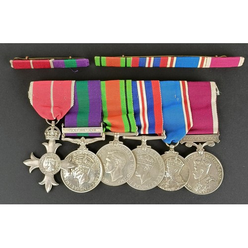 284 - A group of six medals, awarded to 4335043 WO CL II E Green East York Regiment, comprising an MBE, Ge... 