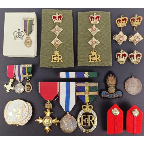 286 - A group of three medals, awarded to Col K W Dale RE, comprising an OBE, a Jubilee medal 1977, and an... 