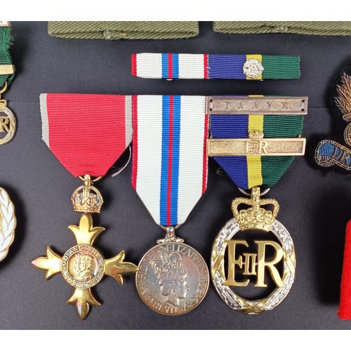 286 - A group of three medals, awarded to Col K W Dale RE, comprising an OBE, a Jubilee medal 1977, and an... 