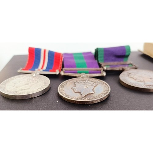 208 - A group of three medals, awarded to 2739660 L/Cpl J A Davies Welsh Guards, comprising a War medal, G... 