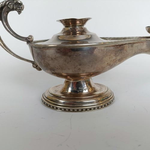 1648 - A silver table top cigar lighter, in the form of an oil lamp