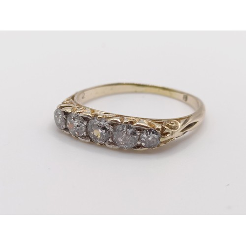 1701 - An 18ct gold five stone diamond ring, ring size O