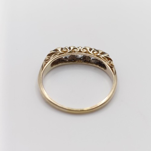 1701 - An 18ct gold five stone diamond ring, ring size O