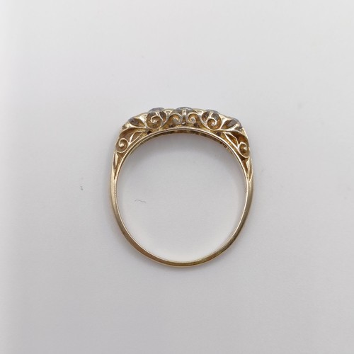 1701 - An 18ct gold five stone diamond ring, ring size O