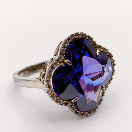 1626 - A silver purple and white stone dress ring, ring size L, and a black stone dress ring, ring size K (... 